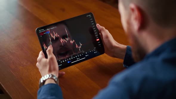 Businessman checking bitcoin price chart on digital exchange on mobile phone screen, cryptocurrency alt