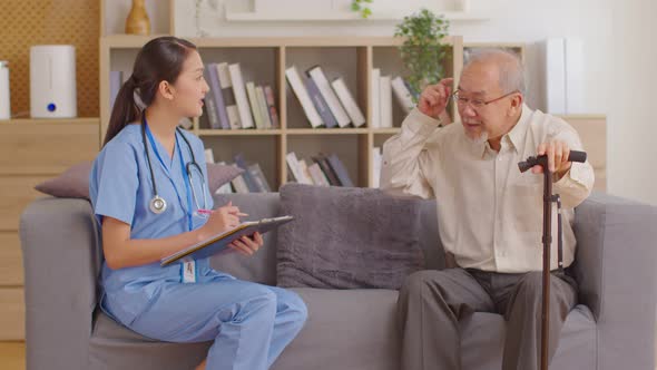 Asian doctor woman visited senior or elderly patient to diagnosis and check up health at home.Happy alt