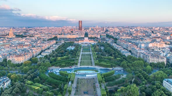Aerial View of a Large City Skyline at Sunset Timelapse alt