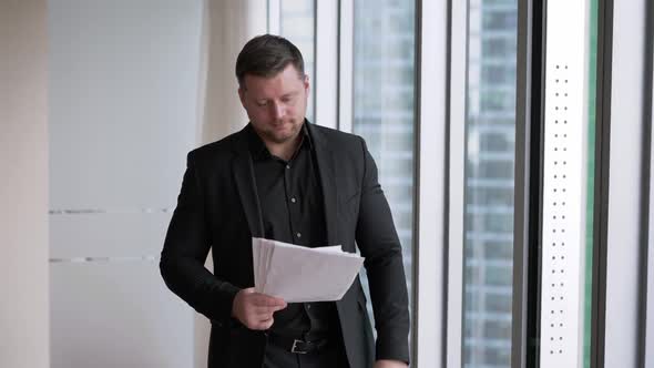 Businessman Tossing Up Papers in Slow Motion alt