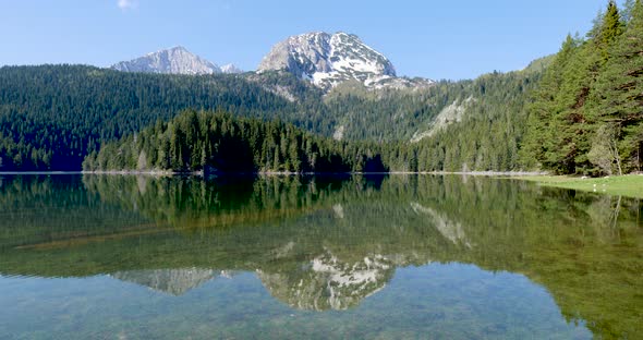 Black Lake in National Park Durmitor in Montenegro. Unesco protected area. Vibrant colors.
