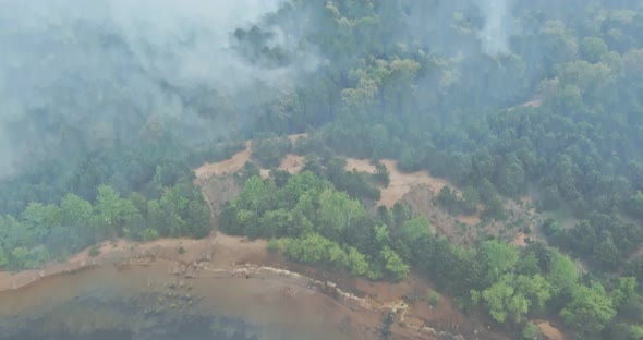 Aerial View with Panoramic Wildfire is Burning Trees Smoke Fire Dry Grass Forest in California alt