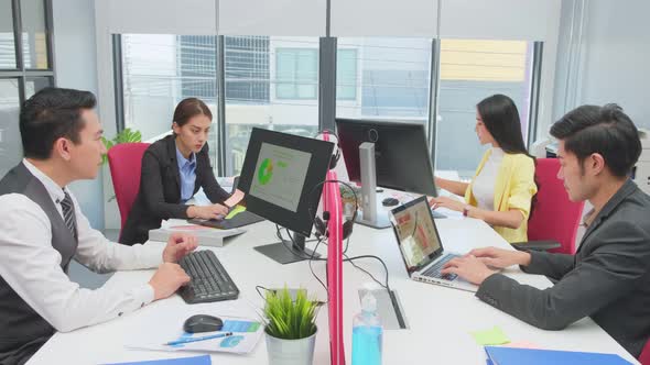 Group of colleague Asian young business people meeting and brainstorming in office as teamwork. alt