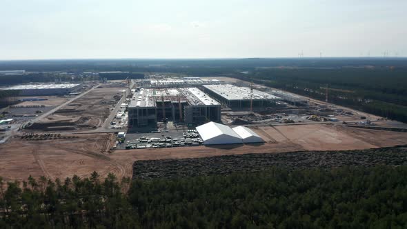 Big Building Construction Site in Nature Area in Europe, Aerial Drone Perspective Wide View alt