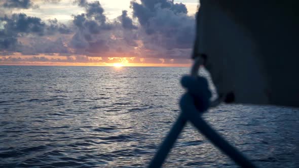 Sail And The Sunset In The Ocean