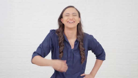 Indian girl laughing alt