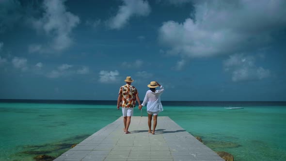 Couple Men and Woman Mid Age on the Beach of Curacao Grote Knip Beach Curacao Dutch Antilles alt