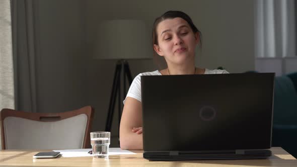Authentic Caucasian Young Woman Chatting On Laptop At Home In Living Room alt
