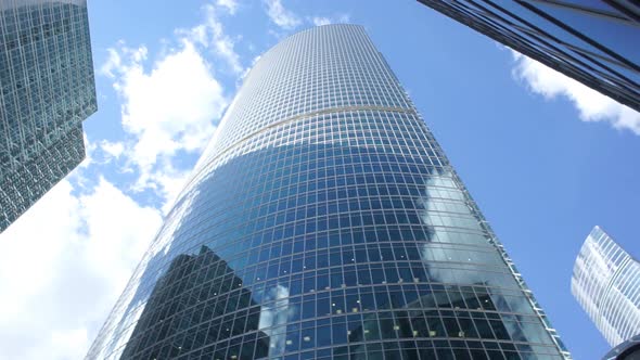 Bottom View of the Glass Facades of Tall Buildings