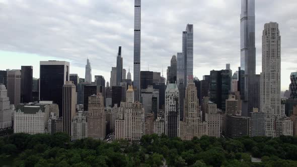 Aerial view over the Central Park, towards supertall skyscrapers in MIdtown, New York, USA - tilt, d alt