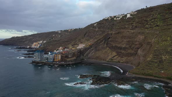 Tenerife, top view of the black volcanic sand beach near the hotels, Atlantic ocean alt