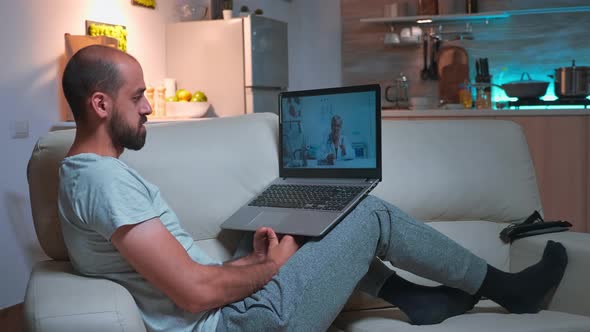 Physician Doctor Consulting Sick Patient During Videocall Consultation alt