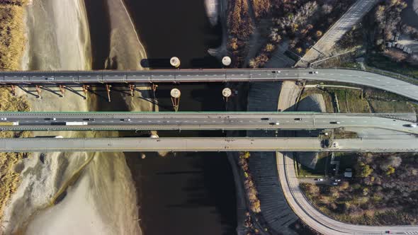 a Large Automobile Bridge Over the River From a Bird'seye View Timelapse