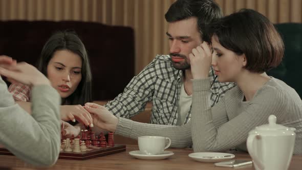 Friends Playing Chess Laughing Spending Holiday alt