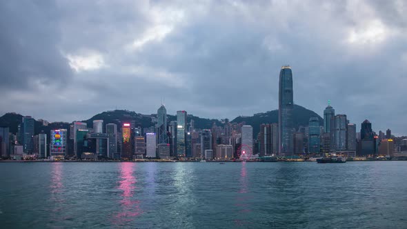 Timelapse of Hong Kong central skyline and Victoria Harbour at dawn alt