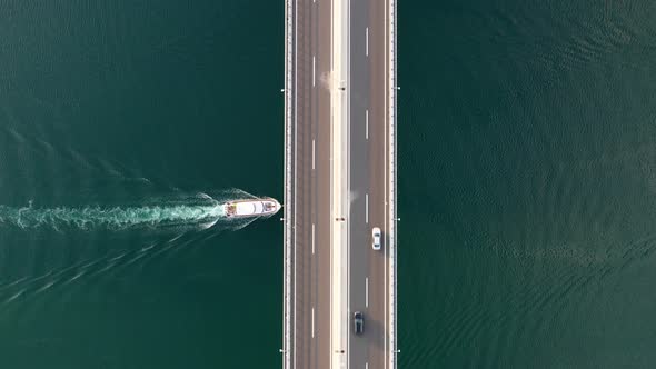 Aerial view on bridge. Highway above sea. View from a drone. alt