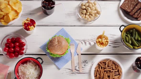 Burger and Bowl of Pickles. alt