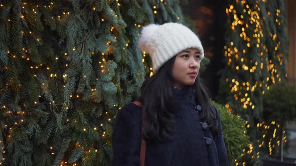 Asian Woman in Europe Street in Winter