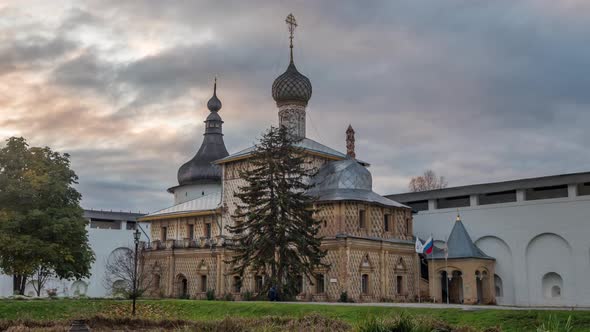 View of the Hodegetria Church in Rostov Kremlin in front of a colorful sunset alt