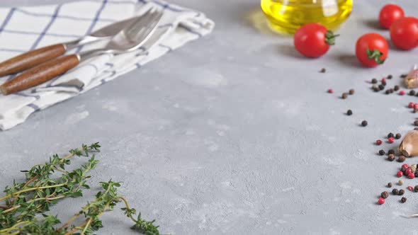 Female hands put a baking dish with baked feta pasta on a light background.