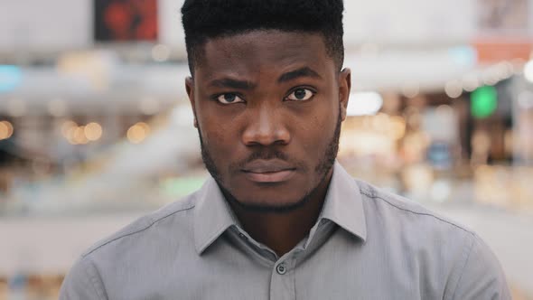 Male Portrait Serious Pensive African American Man Looking at Camera with Confident Look Standing alt