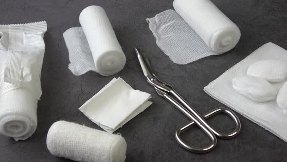 Medical bandages with scissors and sticking plaster. Medical equipment.