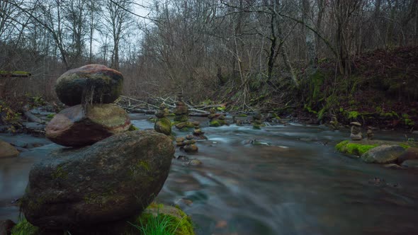 Fall river and pyramid of stones alt