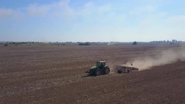 Drone Shooting of Tractors Cultivating Ukrainian Black Soil.