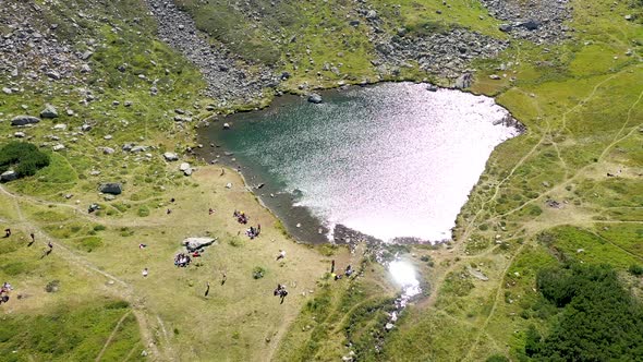 Flying Above Iezer Glacial Lake, Rodnei Mountains, Eastern Carpathians, Romania alt