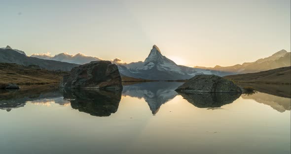 Timelapse Evening View of Stellisee Lake with Matterhorn. Exotic Autumn Scene of Swiss Alps