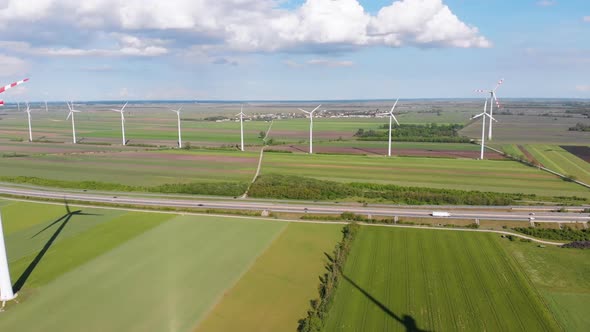 Aerial View of Wind Turbines Farm in Field. Austria. Drone View on Energy Production alt