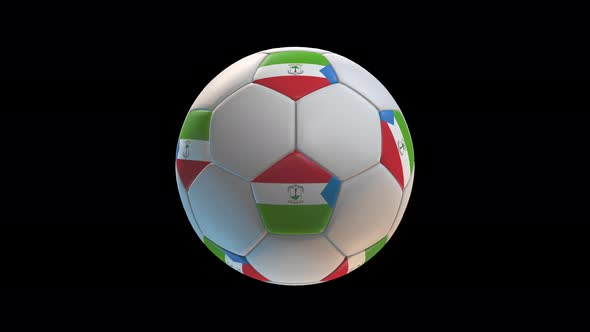Soccer ball with flag Equatorial Guinea, on black background loop alpha