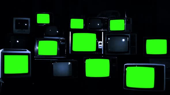 Nine Televisions turning on Green Chroma Screens in a Pile of Retro TVs ...
