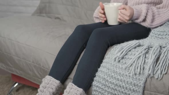 Girl in warm clothes.  alt