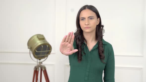 Indian girl stopping alt