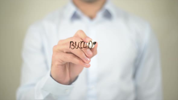 Building Information Modeling Man Writing on Transparent Screen alt