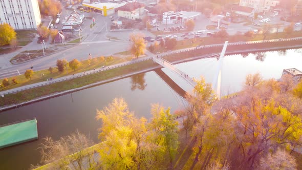Aerial Pedestrian bridge on river in Kharkiv city