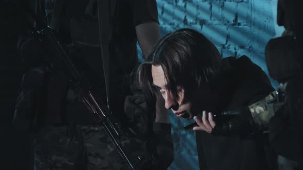 Hostage Talking on Mobile Phone alt