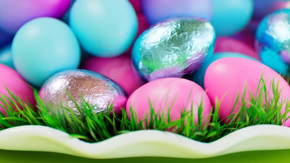 Closing up on the adorable set of Easter chocolate eggs. Happy Easter. alt