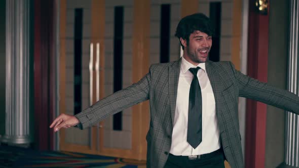 The Man is Dancing Like a Robot alt