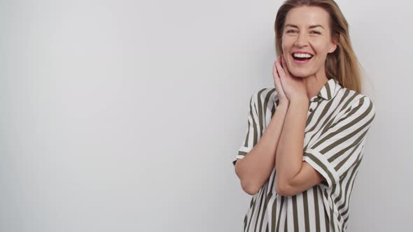 Woman in Striped Top Laughing
