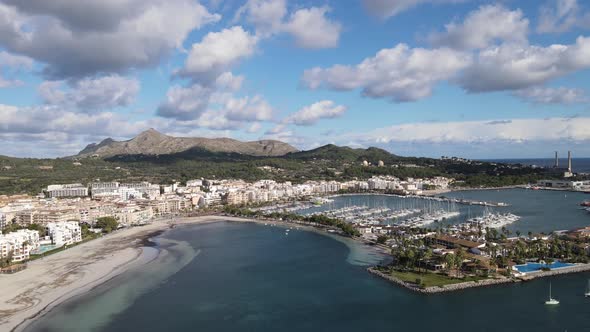 Aerial View of Port d'Alcudia in Mallorca with Mountain in the Background alt