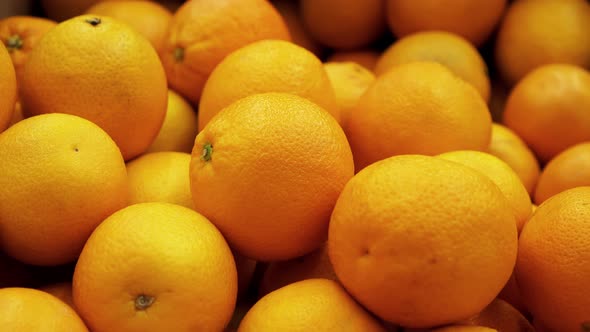 Many Yellow Lemon Close Up Rotating on a  Background in Store for Buyer. alt