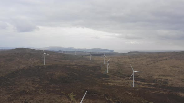Wind farm in Scotland with turbines for electrical energy generation