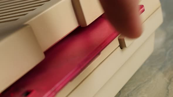 Pink ancient floppy disk inserting  in personal computer 4K 3840X2160 UltraHD footage - Floppy disk  alt