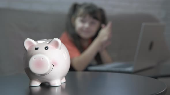 Child work on computer for money. alt