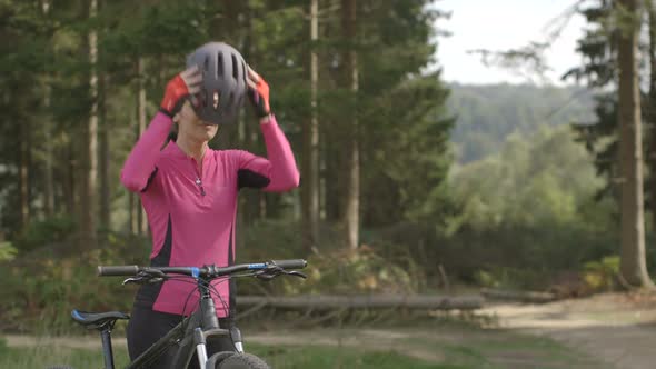 Woman getting ready for cycling