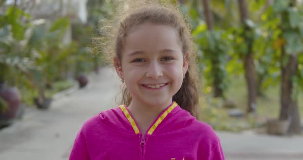 Portrait Funny Little Girl Smiling Child Looking at Camera Are Walking on Street Cute Kid Child with alt