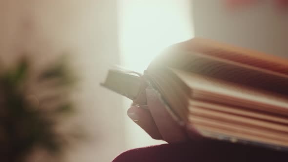 Woman Reads Book and Turning Pages. Woman Reading Book