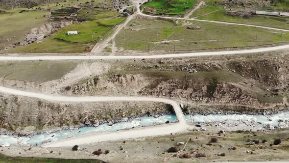 Aerial View of the Village Which is Located Between Caucasus Mountains alt